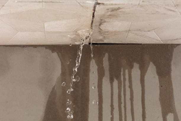 Professional Flood Damage Cleanup technician working in Brightwaters, NY